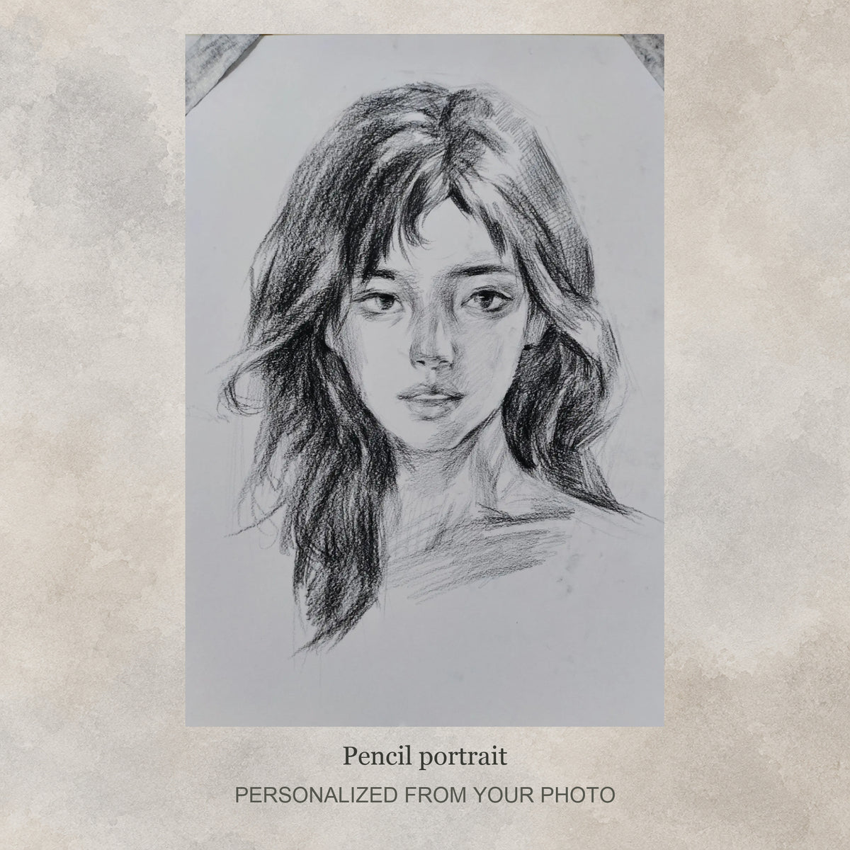Custom Pencil Sketch Portrait | Soft Graphite Hand-Drawn from Your Photo — original drawing example on a flat soft greige textured graphic background; no frame shown