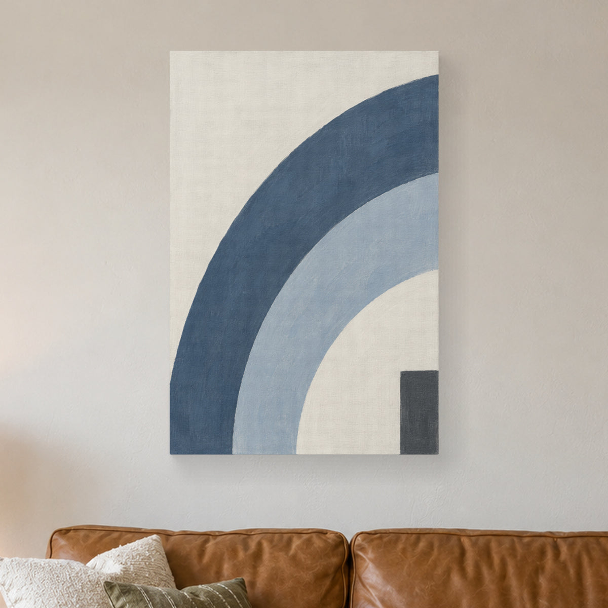 Blue Grey Echo canvas print on a wall above a sofa in natural light