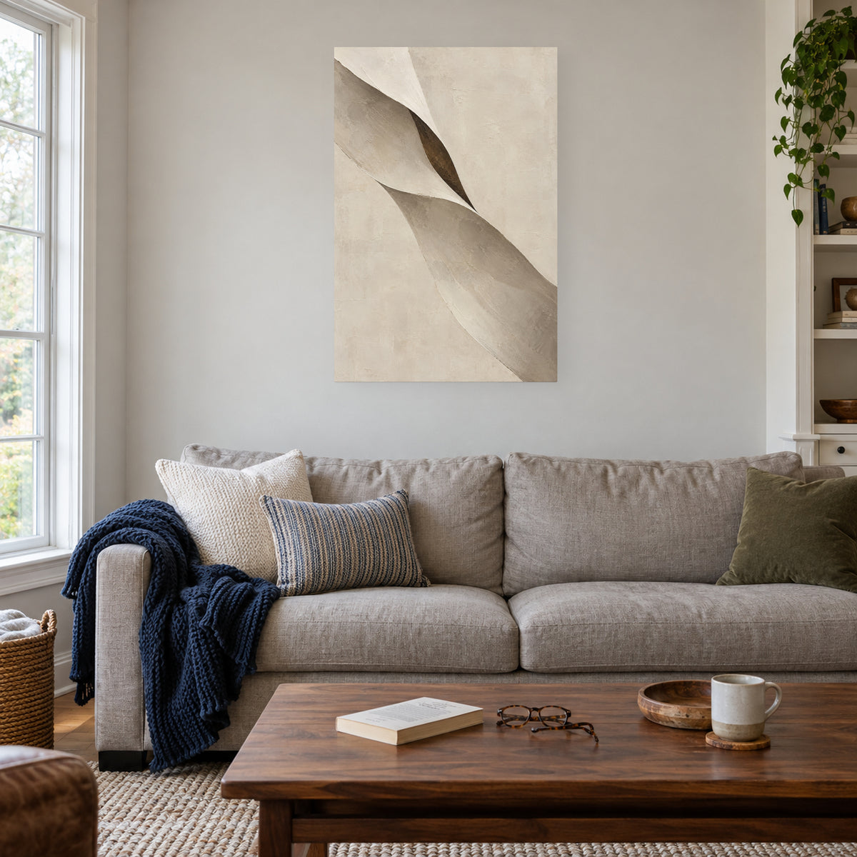 Limestone Folds — Abstract Canvas Wall Art — ivory and taupe folded forms — canvas displayed during afternoon reading — image 03
