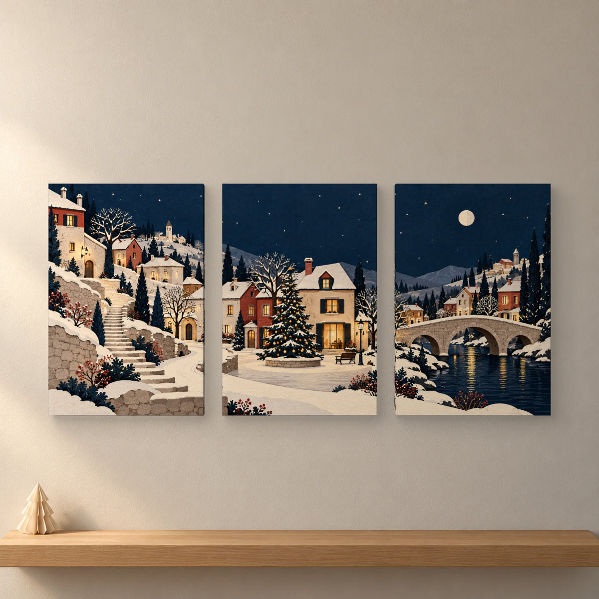 A Paper Christmas Village — Christmas 3-Piece Canvas Wall Art Set — Complete original artwork on a softly lit wall — Image 1