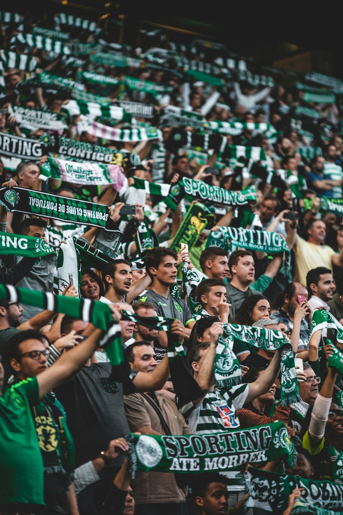 Soccer fans crowd holding green banners World Cup 2026 gift ideas