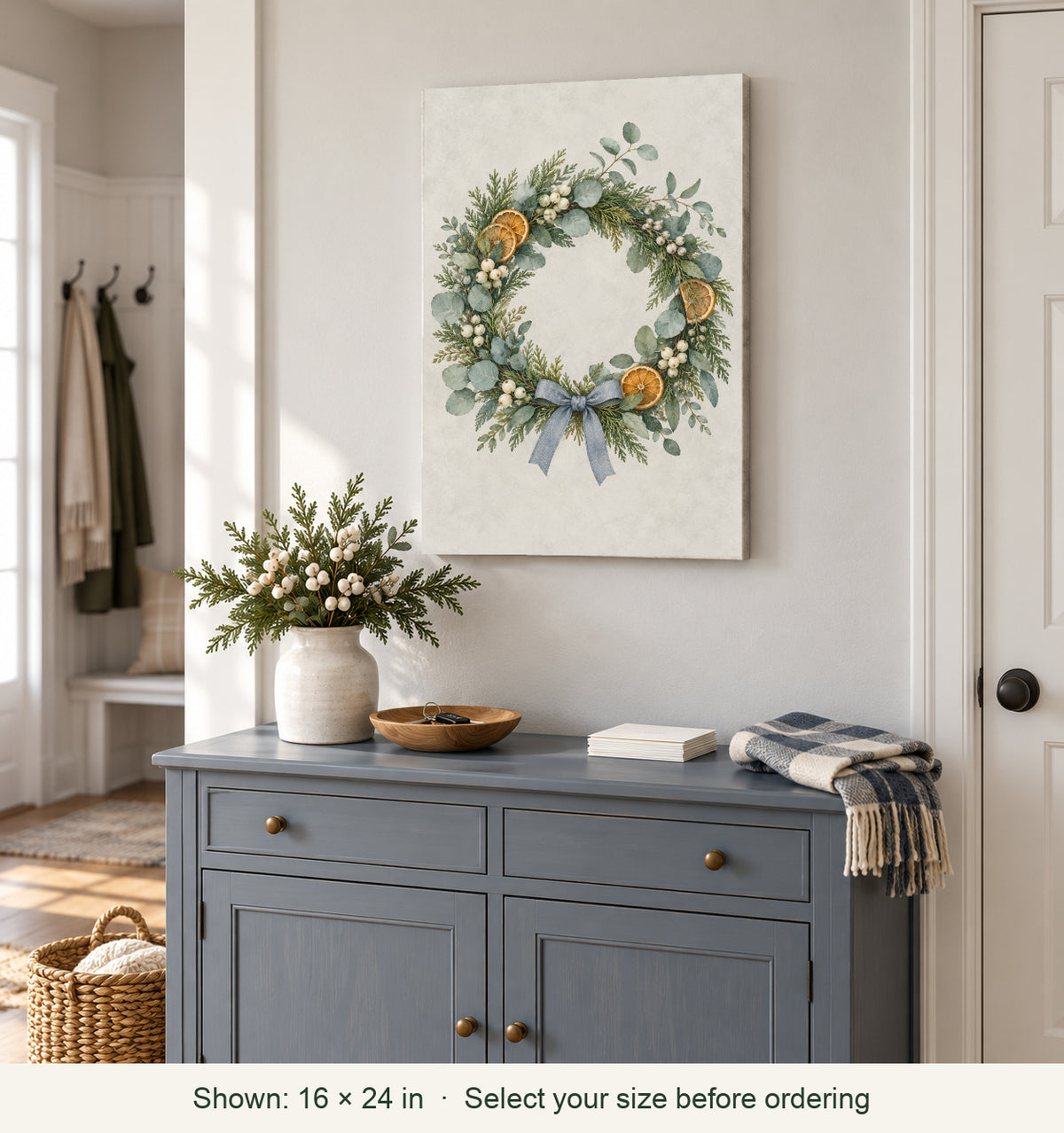 Styled home; canvas shown in 16 by 24 inch size: Frosted Welcome Winter Wreath Canvas Wall Art