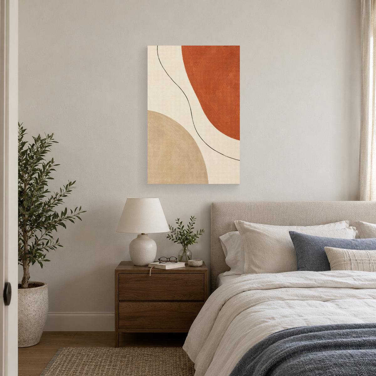 Warm Clay Balance canvas print displayed above a bed