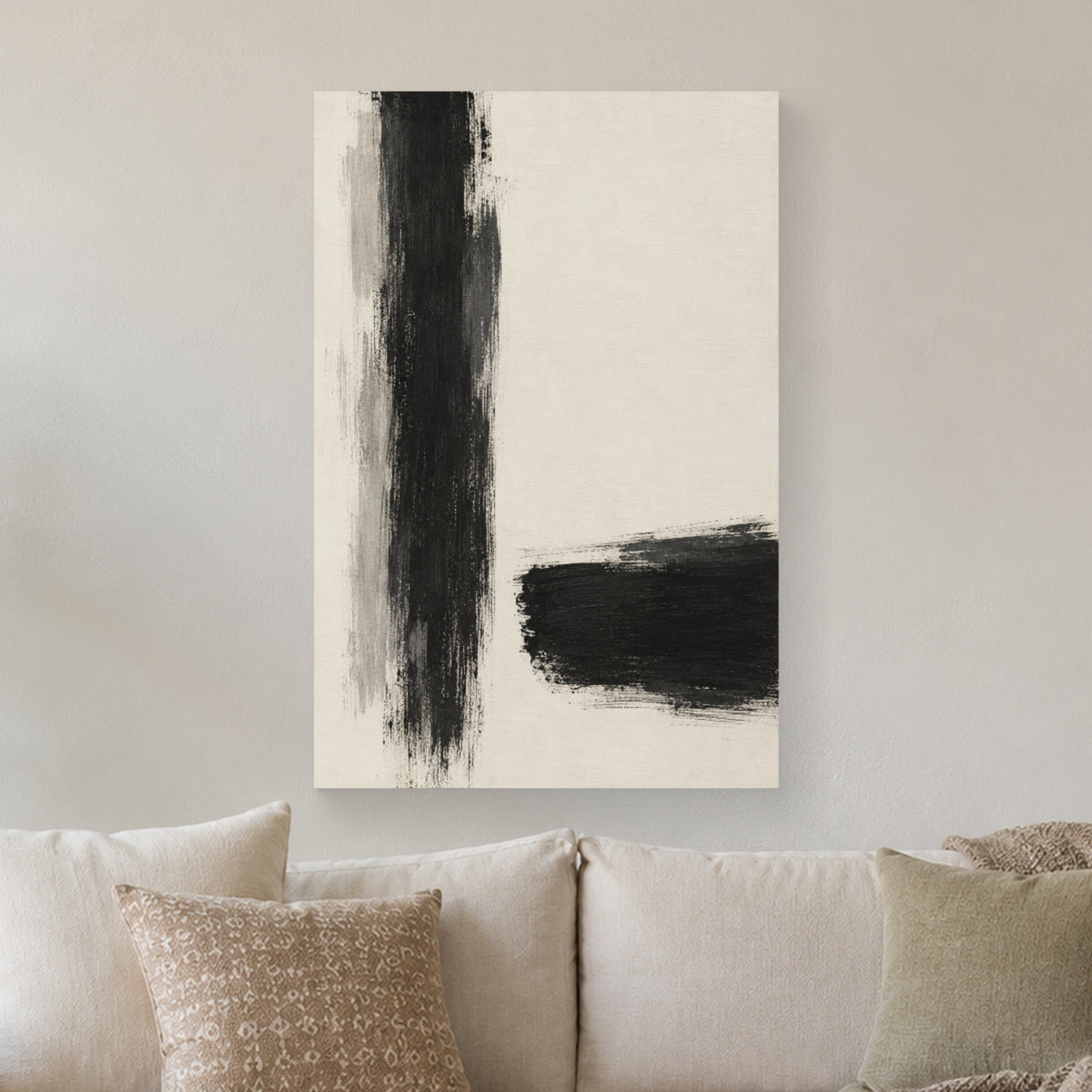 Between the Strokes canvas print on a wall above a sofa in natural light