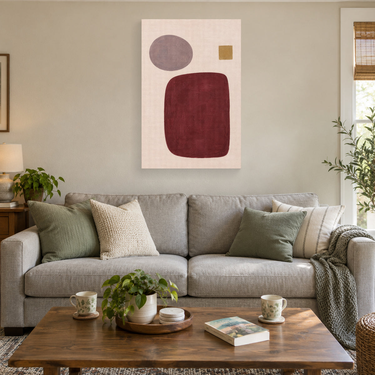 Burgundy Order canvas print displayed above a sofa during afternoon tea