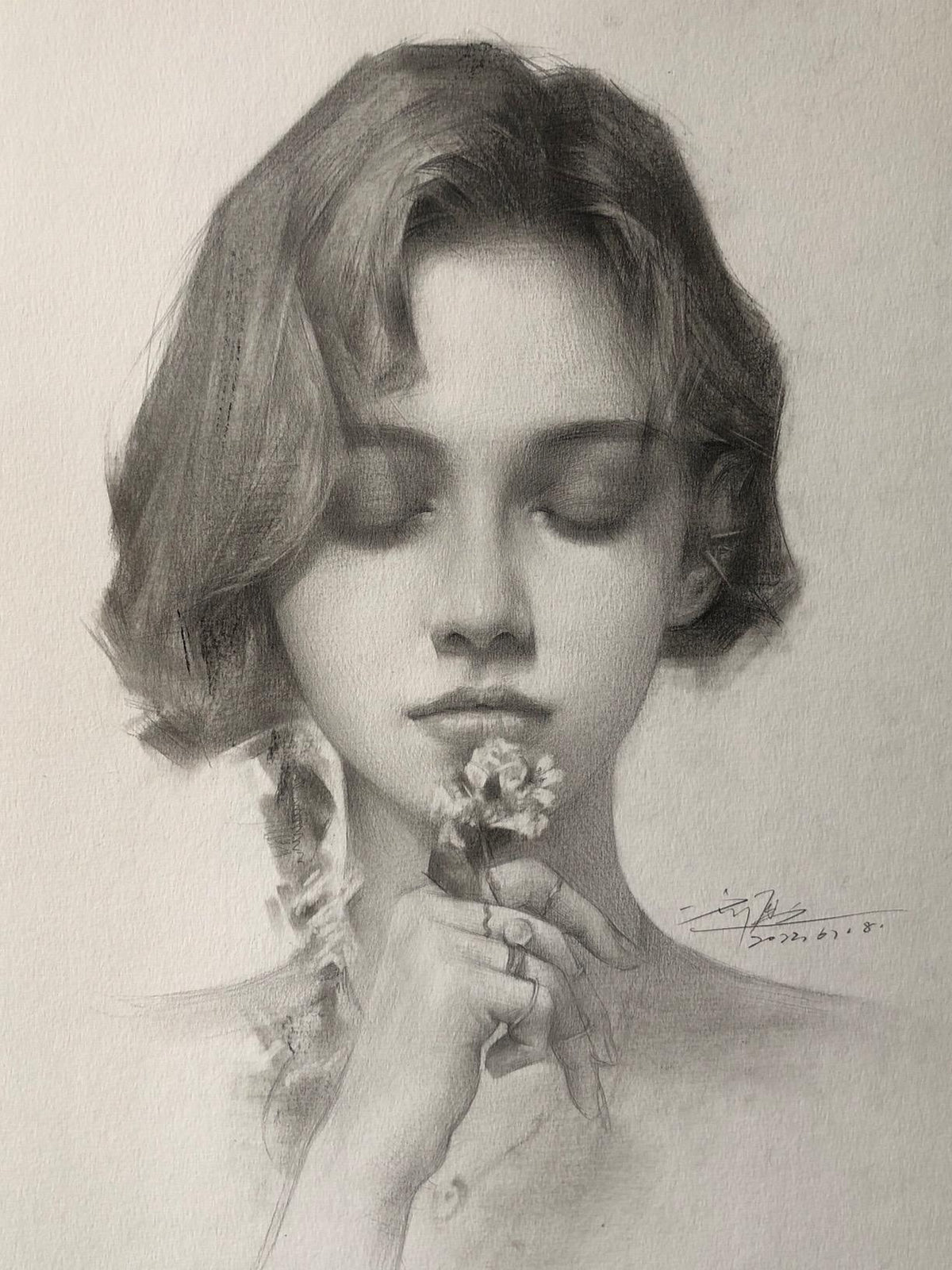Finished hand-drawn charcoal portrait created from the reference photo